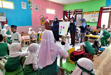 Students and teacher in a classroom setting