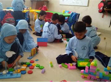 Group of children sitting in a classroom